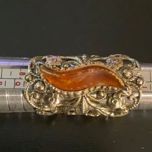 Ring with Amber colored Stone Gold tone filagree 1.5” long Adjustable